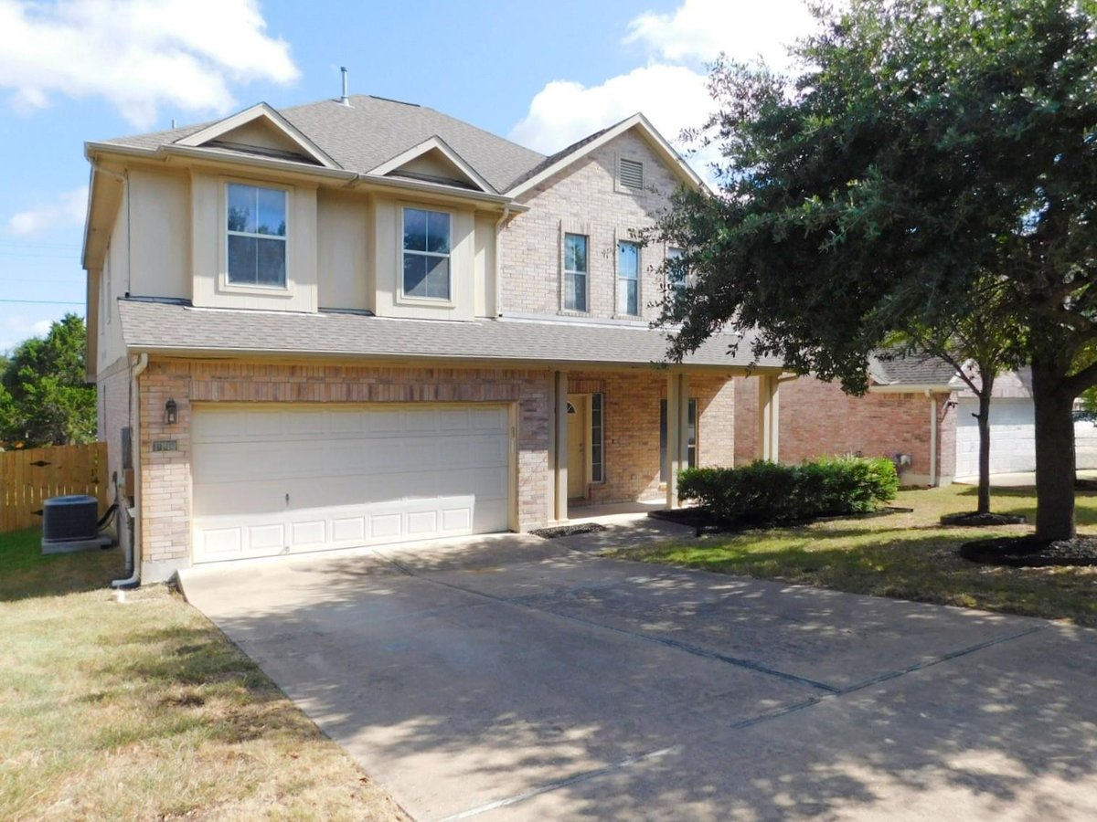 View 1411 Encino DR in Vista Ridge Ph 01 1411 Encino DR - front exterior - Luxury home in Vista Ridge Ph 01, Leander, TX
