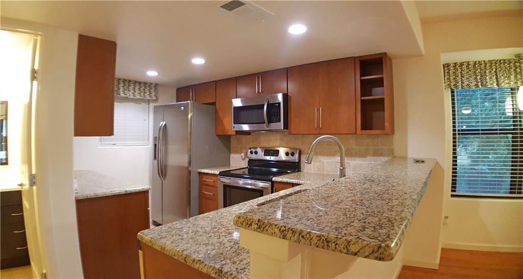 View 1411 Norwalk LN Unit #203 in Norwalk Square Condo 1411 Norwalk LN Unit #203 - property photo 1 - Luxury home in Norwalk Square Condo, Austin, TX