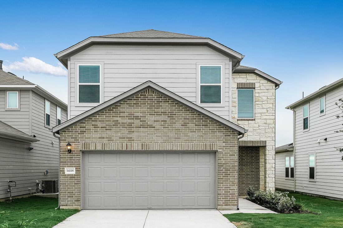 View 14118 Edna Maxine Walk in Longview 14118 Edna Maxine Walk - front exterior - Luxury home in Longview, Del Valle, TX