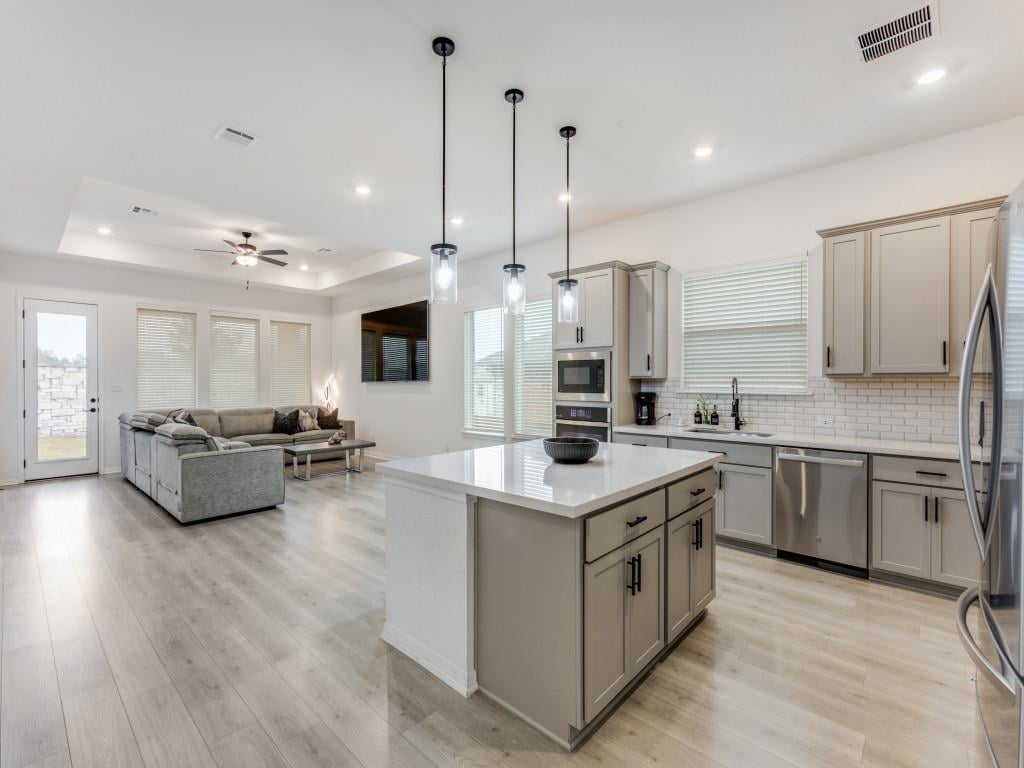 Living area at 142 Milam Creek Dr - 4 bed 3 bath home