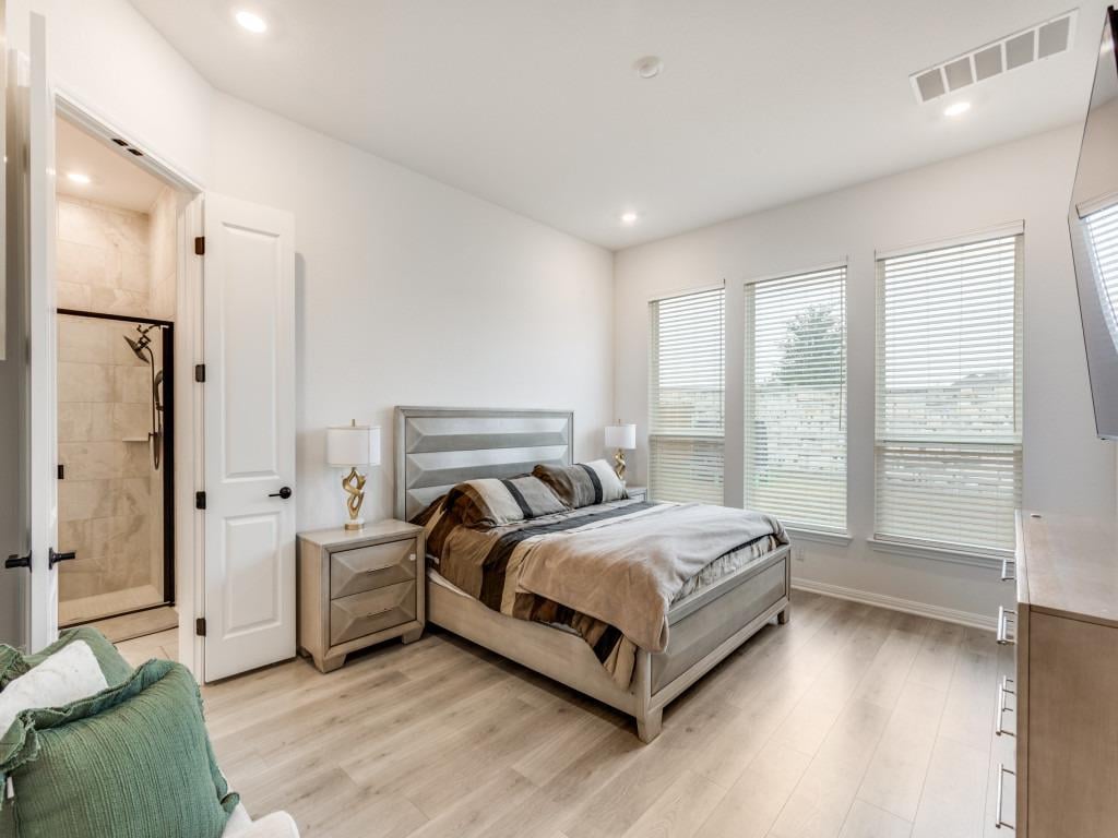 Primary bedroom at 142 Milam Creek Dr - 4 bed 3 bath home