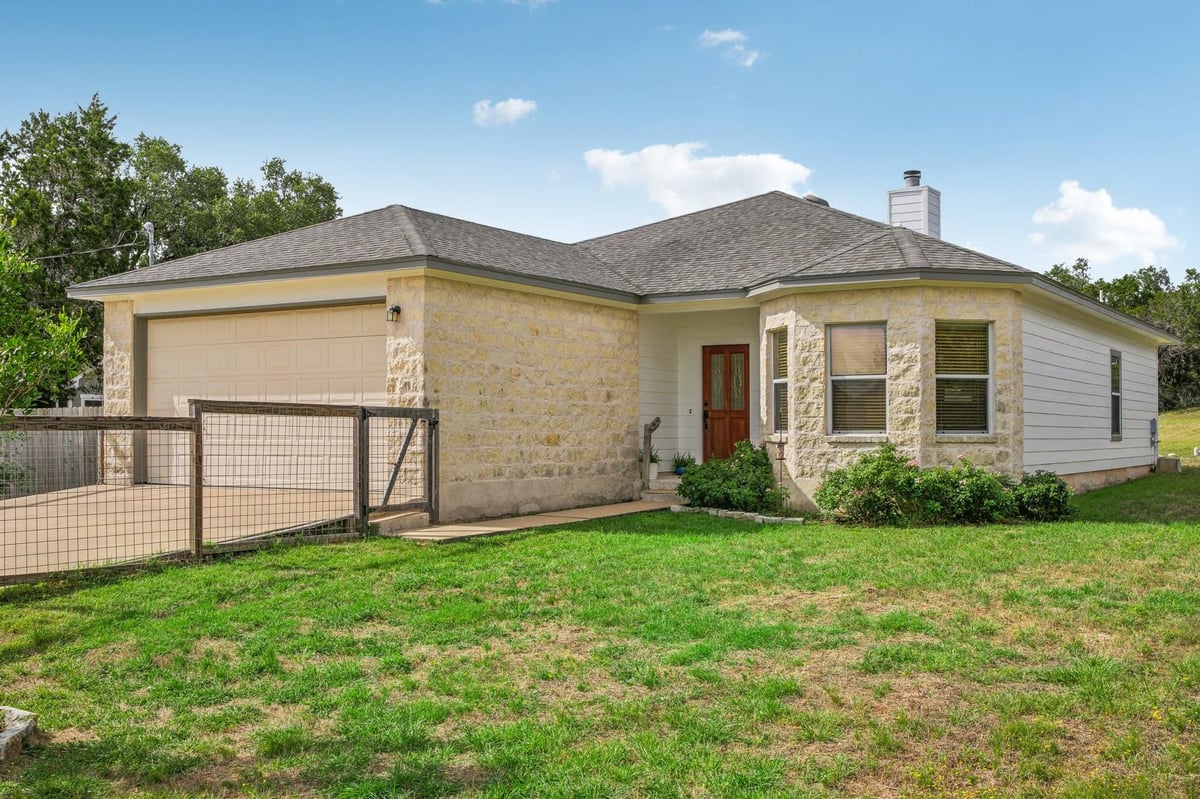 View 14205 Fort Smith Trl in Apache Shores Sec 07 14205 Fort Smith Trl - front exterior - Luxury home in Apache Shores Sec 07, Austin, TX