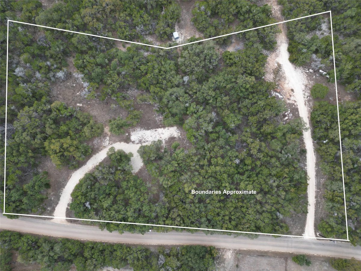 View 1425 Longhorn Trl Rd in None 1425 Longhorn Trl Rd - front exterior - Luxury lot in None, Wimberley, TX