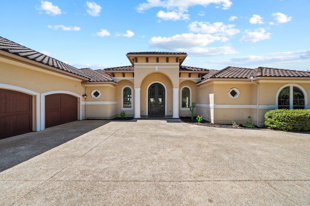 View 143 Champion Way in STALLION ESTATES 143 Champion Way - front exterior - Luxury home in STALLION ESTATES, Spring Branch, TX