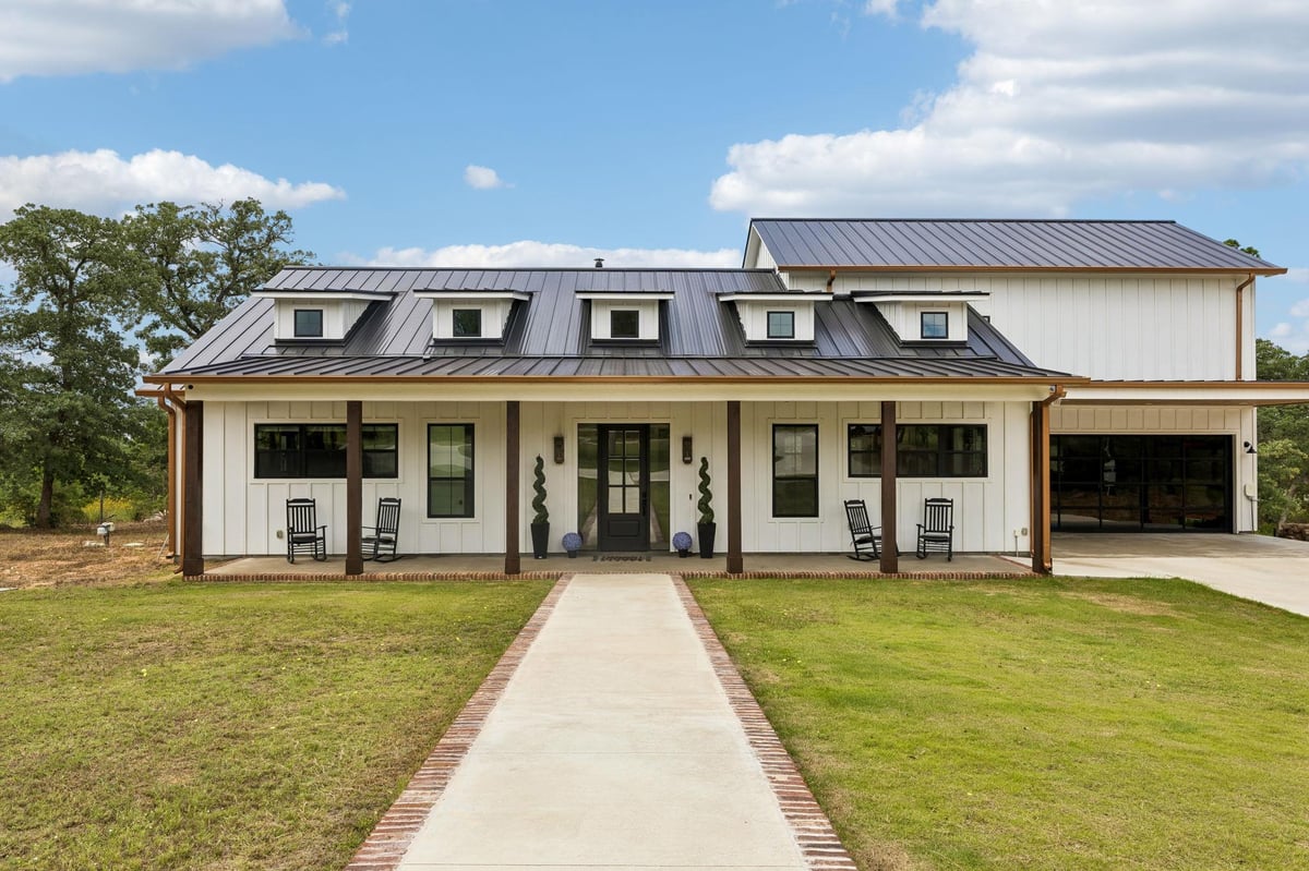 View 143 W Tanglebriar CT in Pine Forest 143 W Tanglebriar CT - front exterior - Luxury home in Pine Forest, Bastrop, TX