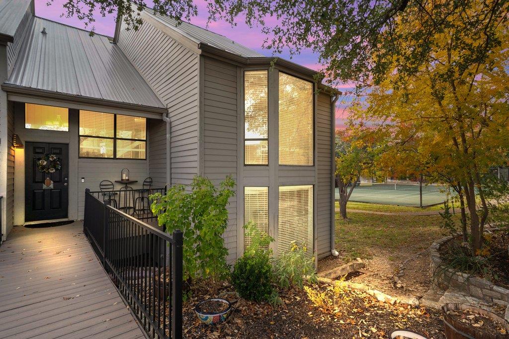 143 World Of Tennis Sq Unit #D143 - front exterior - Luxury home in Lakeway World Tennis Condo, Lakeway, TX