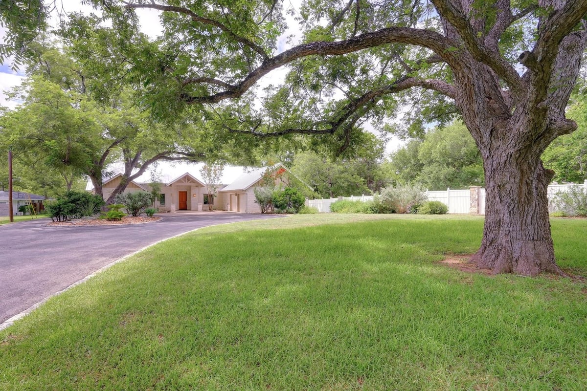 View 1440 Flite Acres Rd in Eagle Cave View 1440 Flite Acres Rd - property photo 1 - Luxury home in Eagle Cave View, Wimberley, TX