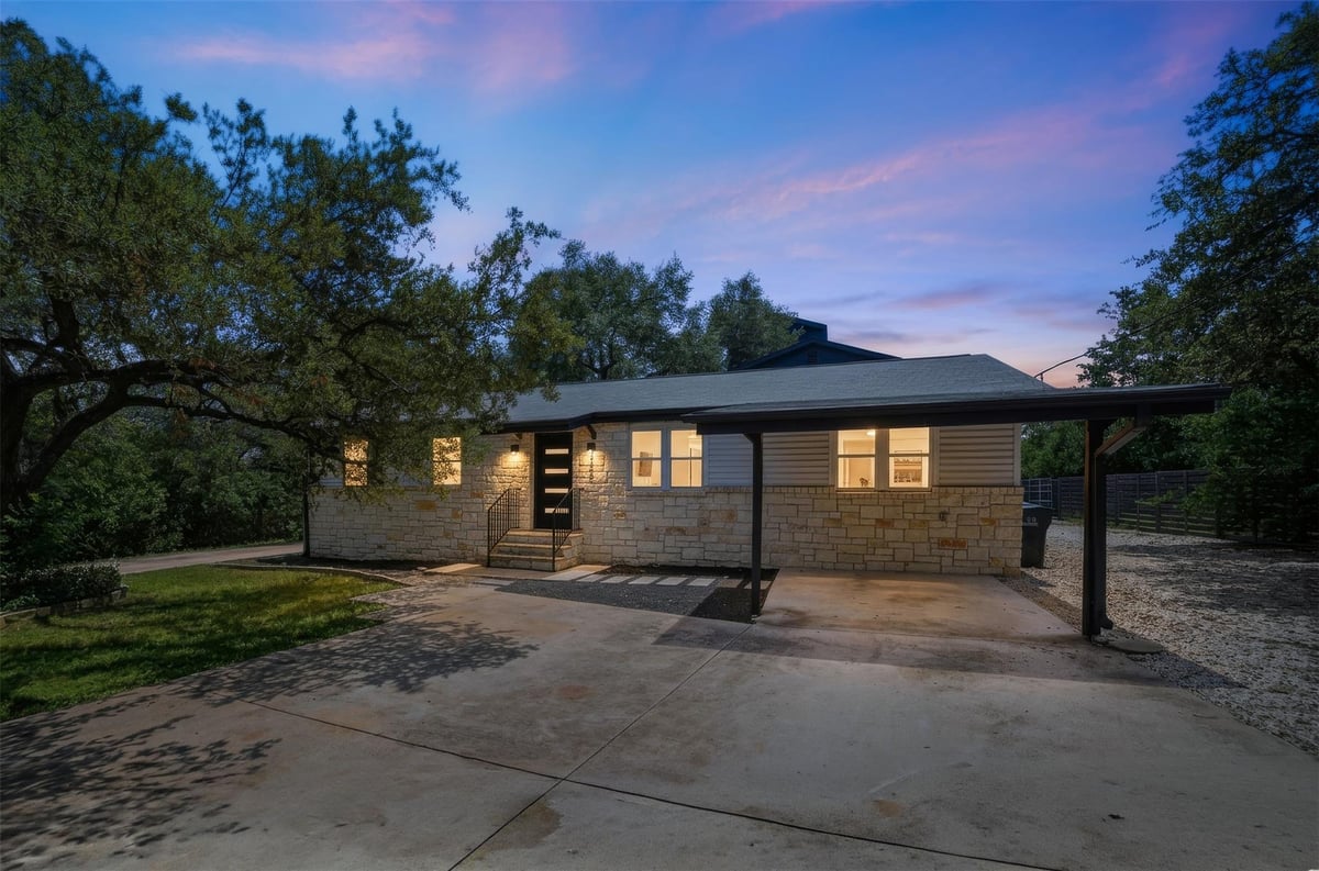 View 14405 Tucumcari TRL in Apache Shores Sec 07 14405 Tucumcari TRL - front exterior - Luxury home in Apache Shores Sec 07, Austin, TX
