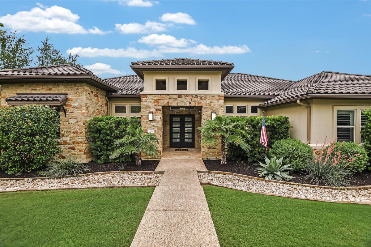 View 14413 Piper Glen DR in Spillman Ranch / Falconhead 14413 Piper Glen DR - front exterior - Luxury home in Spillman Ranch / Falconhead, Austin, TX