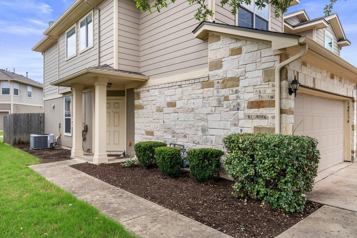View 14417 Charles Dickens Dr Unit #A in Parkside At Northtown Condominiums 14417 Charles Dickens Dr Unit #A - front exterior - Luxury home in Parkside At Northtown Condominiums, Pflugerville, TX