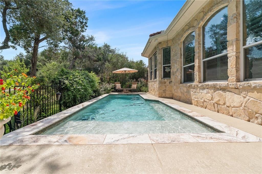 View 14421 American Kestrel Dr in Spillman Ranch Ph 01 Sec 01 14421 American Kestrel Dr - front exterior - Luxury home in Spillman Ranch Ph 01 Sec 01, Austin, TX