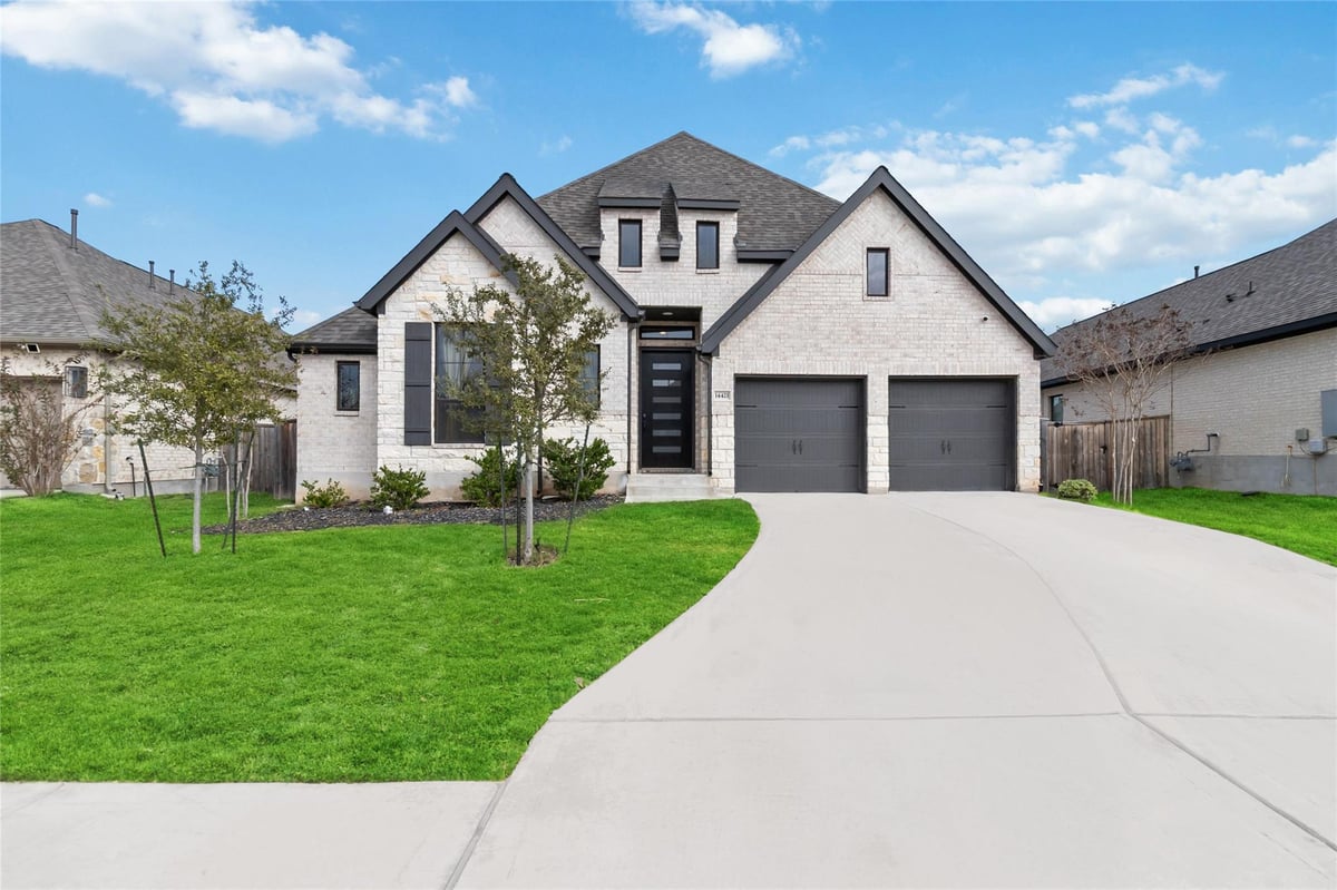 View 14421 Kira LN in SHADOWGLEN PHS 2 14421 Kira LN - front exterior - Luxury home in SHADOWGLEN PHS 2, Manor, TX
