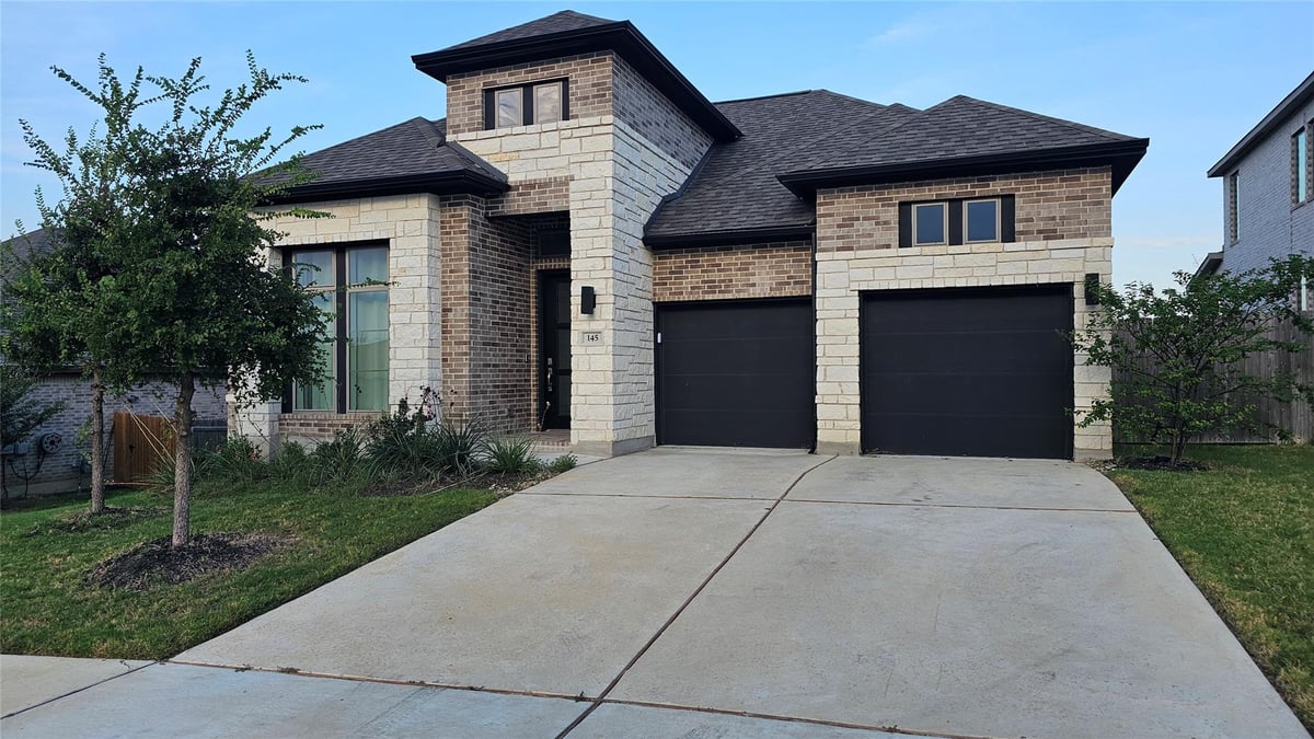 View 145 Cyrus Milton Dr in Carpenter Hill Sec 4 145 Cyrus Milton Dr - front exterior - Luxury home in Carpenter Hill Sec 4, Buda, TX
