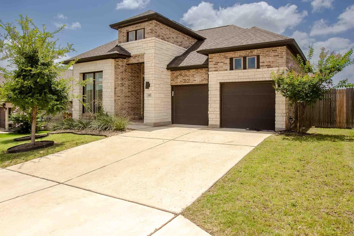 View 145 Cyrus Milton Dr in Carpenter Hill Sec 4 145 Cyrus Milton Dr - front exterior - Luxury home in Carpenter Hill Sec 4, Buda, TX