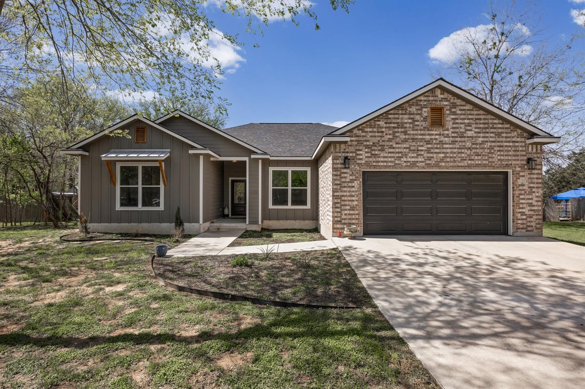 View 145 Haliimaile Ln in Tahitian Village, 145 Haliimaile Ln - front exterior - Luxury home in Tahitian Village,, Bastrop, TX