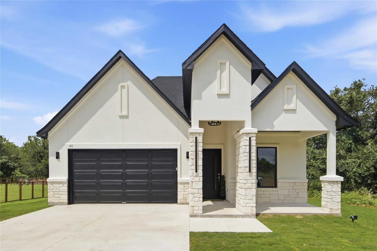 View 145 Kawainui LN in Tahitian Village, 145 Kawainui LN - front exterior - Luxury home in Tahitian Village,, Bastrop, TX