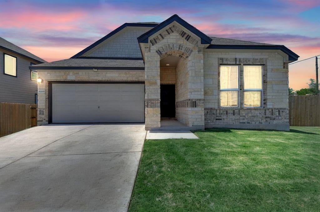 View 14516 Isidors Eagle Way in Eagles Lndg Ph 2 14516 Isidors Eagle Way - front exterior - Luxury home in Eagles Lndg Ph 2, Elgin, TX