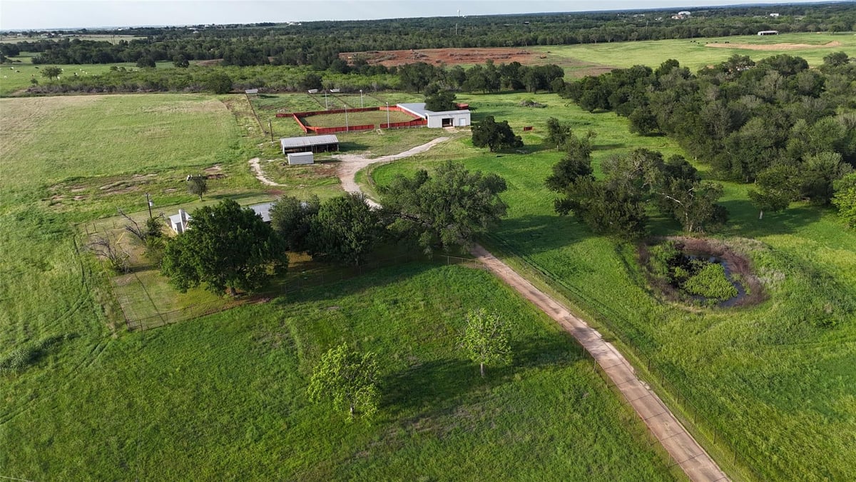 View 1454 Red Town RD in Casner, Isaac 1454 Red Town RD - front exterior - Luxury home in Casner, Isaac, Elgin, TX