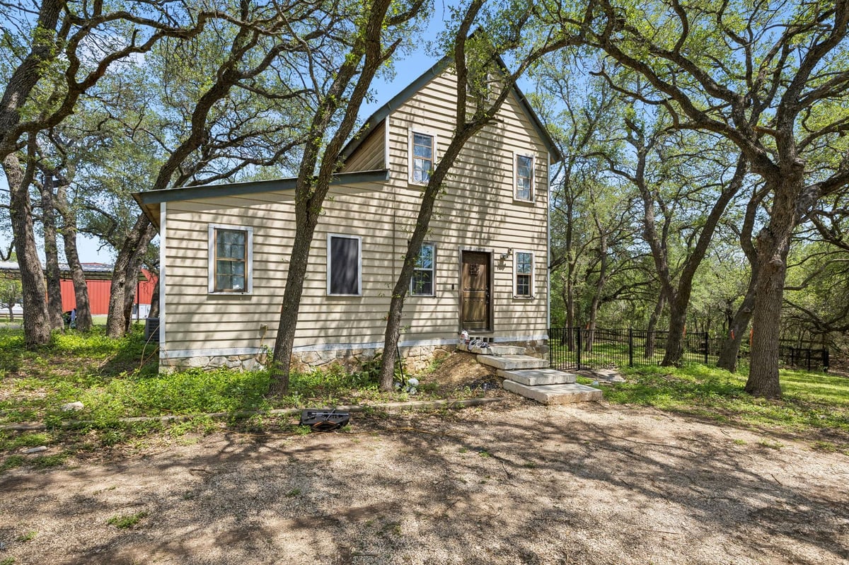 View 1455 Fm 1626 in A0001 PHILLIP J ALLEN 1455 Fm 1626 - front exterior - Luxury home in A0001 PHILLIP J ALLEN, Buda, TX