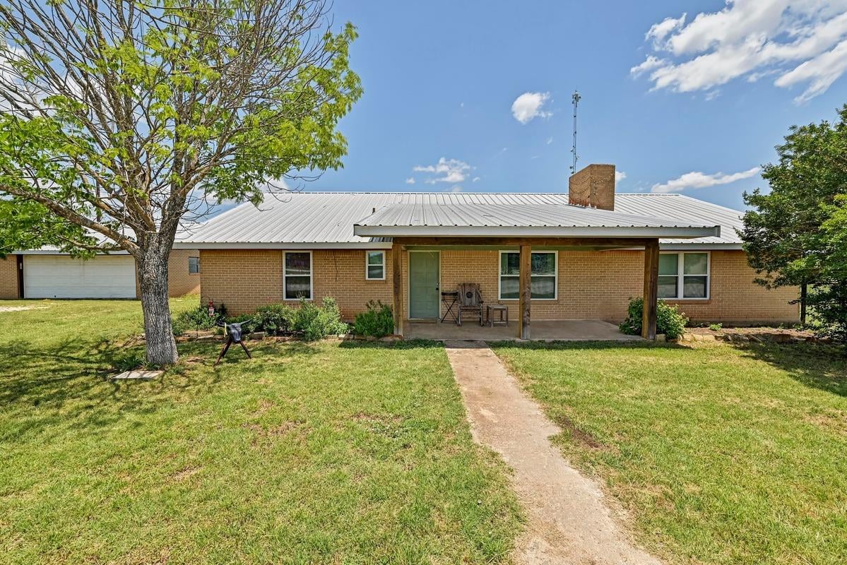 14550 RR 2338 - front exterior with 14550 RR 2338 in Georgetown - Luxury home in none, Georgetown, TX