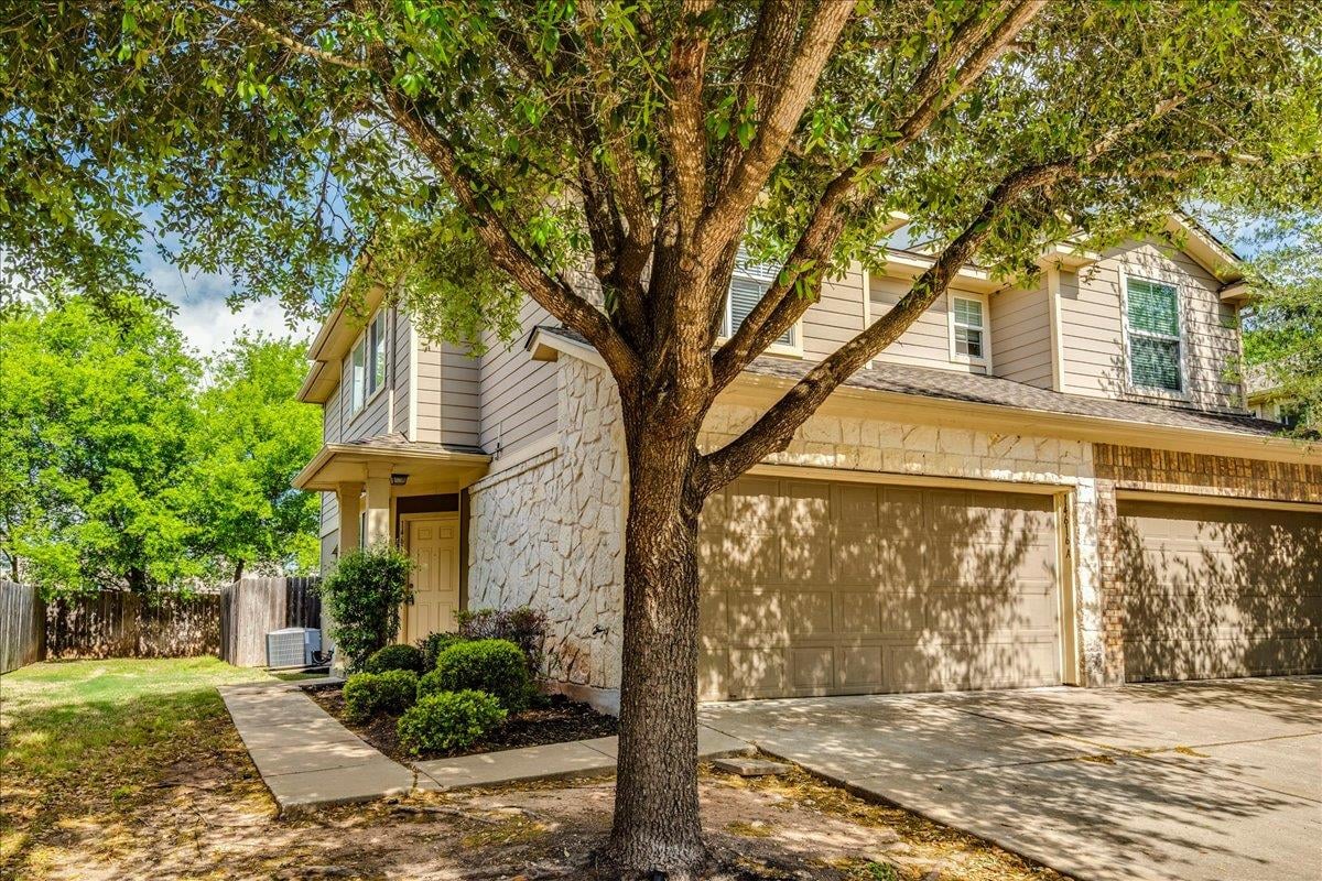 View 14616 Walt Whitman Trl Unit #A in Parkside At Northtown Condomin 14616 Walt Whitman Trl Unit #A - front exterior - Luxury home in Parkside At Northtown Condomin, Pflugerville, TX
