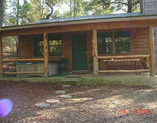 View 147 O'Grady RD 147 O'Grady RD - front exterior - Luxury home in Smithville, TX