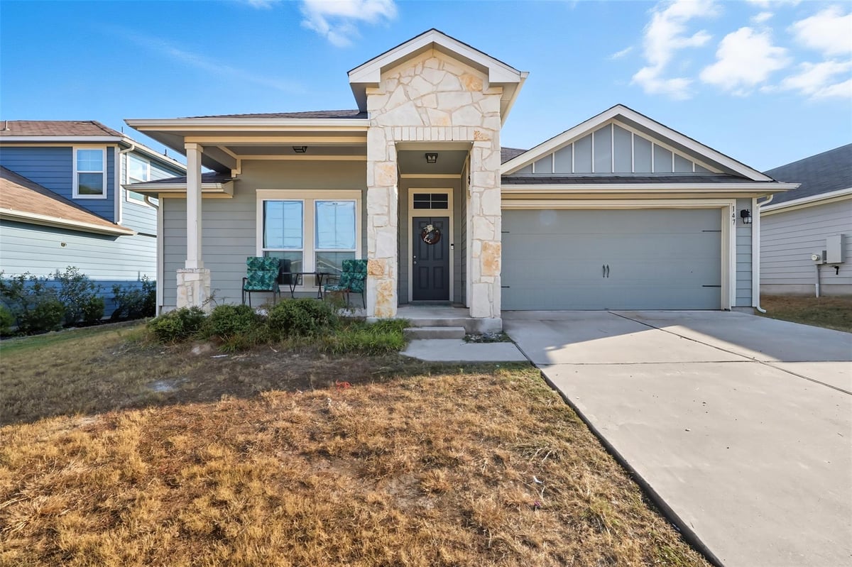 View 147 Sulphur River Loop in Riverwalk Ph 3 Sec 2 147 Sulphur River Loop - front exterior - Luxury home in Riverwalk Ph 3 Sec 2, Hutto, TX