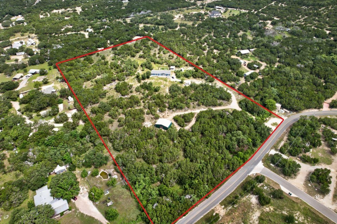 View 14810 Chaparral DR in Roundmountain Oaks 14810 Chaparral DR - front exterior - Luxury home in Roundmountain Oaks, Leander, TX