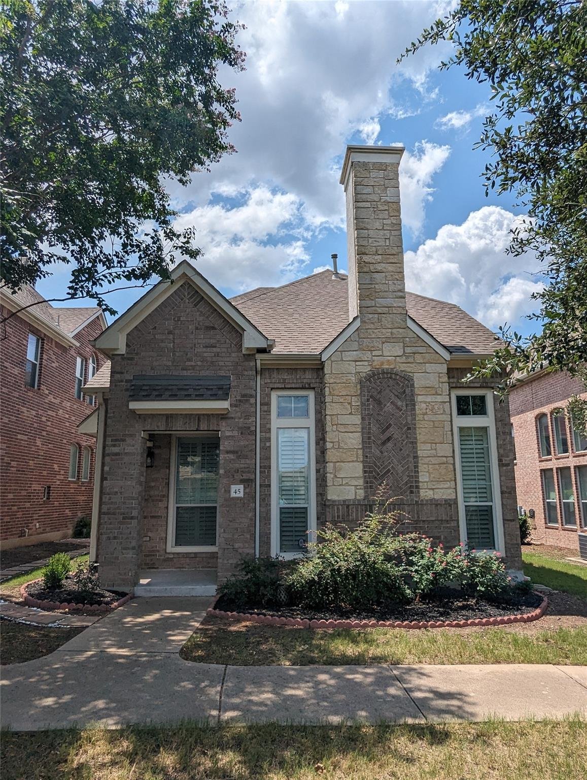 View 14812 Avery Ranch Blvd Unit #45 in Plaza Twnhms At Avery Ranch Condo 14812 Avery Ranch Blvd Unit #45 - front exterior - Luxury home in Plaza Twnhms At Avery Ranch Condo, Austin, TX