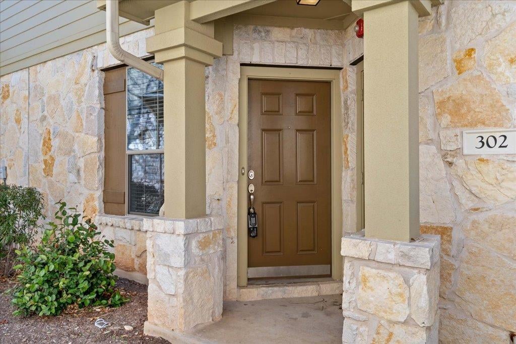 View 14815 Avery Ranch Blvd Unit #302 in AVERY COMMONS 14815 Avery Ranch Blvd Unit #302 - front exterior - Luxury home in AVERY COMMONS, Austin, TX