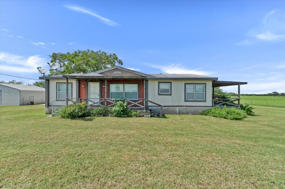 View 14858 Fm 1322 in NONE 14858 Fm 1322 - front exterior - Luxury home in NONE, Luling, TX