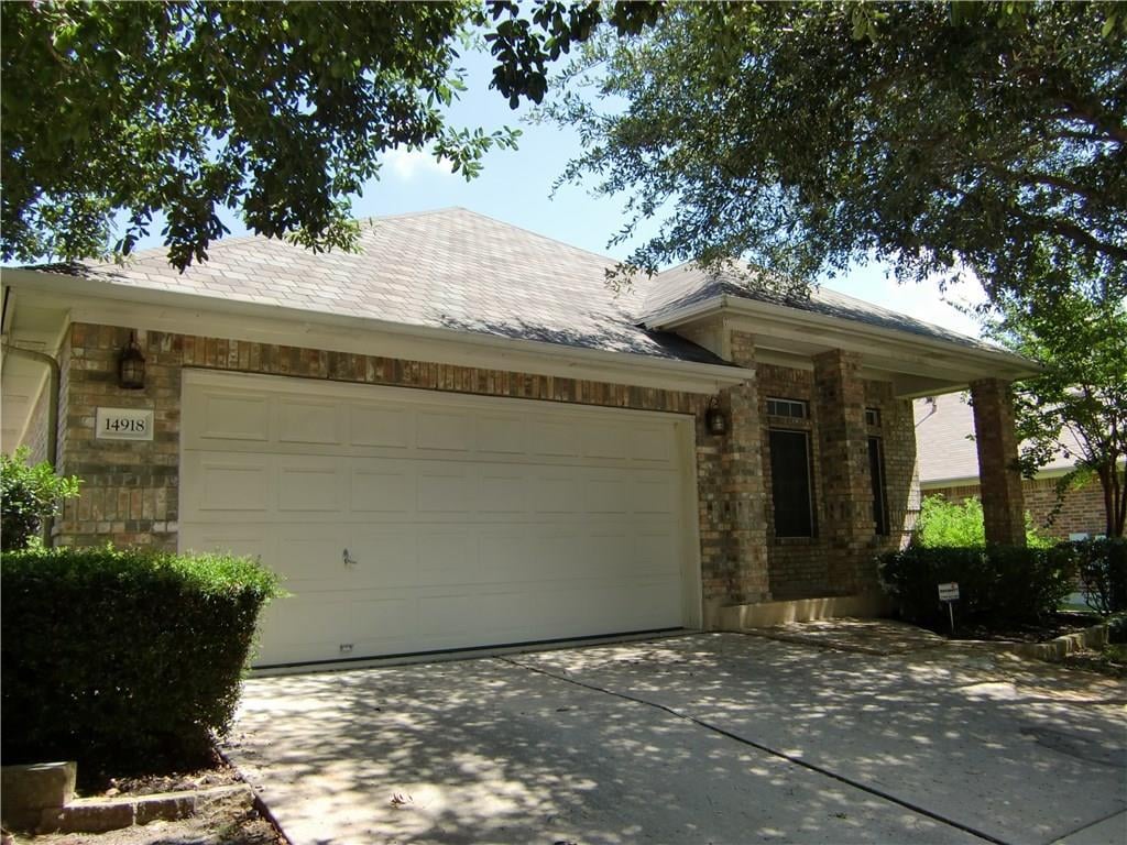 View 14918 Doria Dr in Lake At Wells Branch Sec 02 14918 Doria Dr - front exterior - Luxury home in Lake At Wells Branch Sec 02, Austin, TX