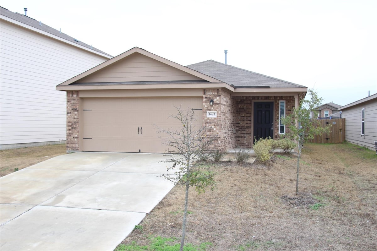 View 1493 Breanna LN in Bunton Creek Ph 2A 1493 Breanna LN - front exterior - Luxury home in Bunton Creek Ph 2A, Kyle, TX