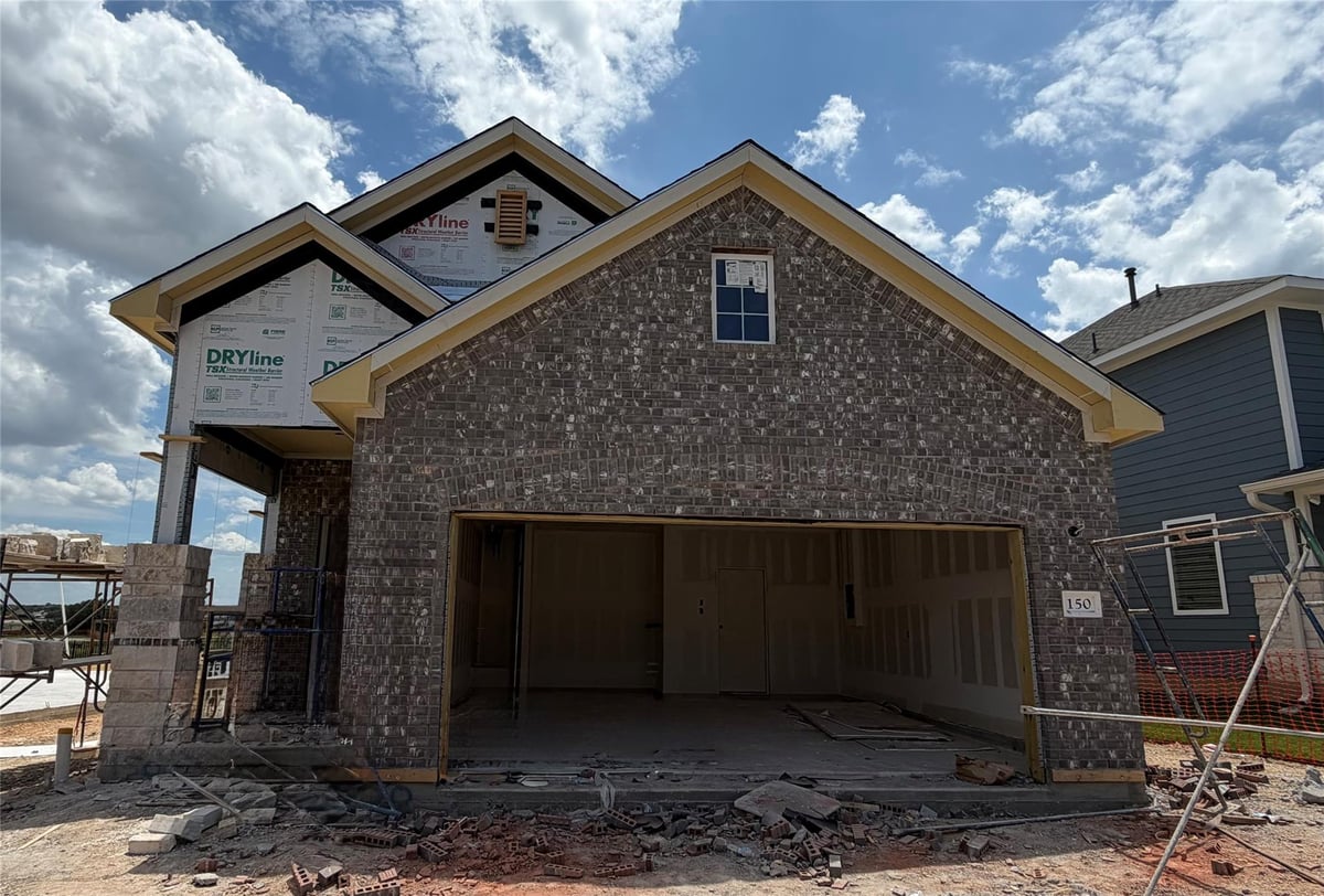 View 150 Clover BND in Lariat 150 Clover BND - front exterior - Luxury home in Lariat, Liberty Hill, TX
