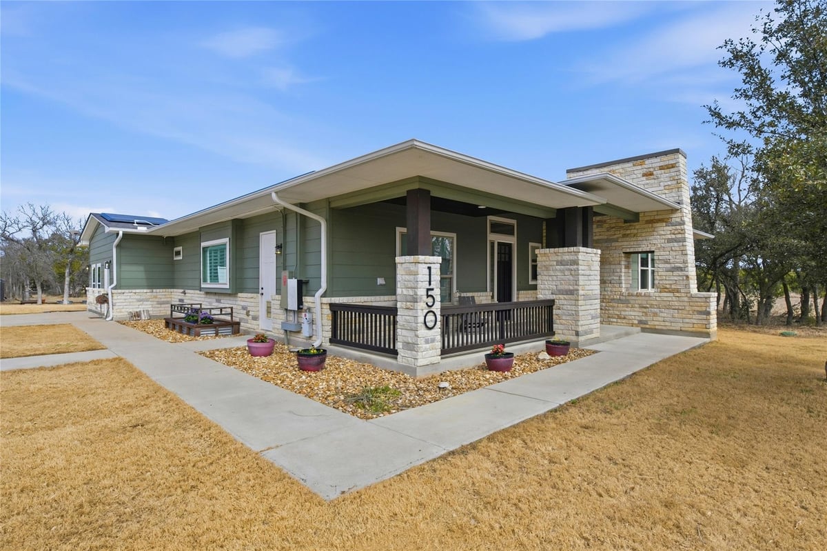 View 150 County Road 220 in RANCHES AT SALADO BROOK 150 County Road 220 - front exterior - Luxury home in RANCHES AT SALADO BROOK, Florence, TX