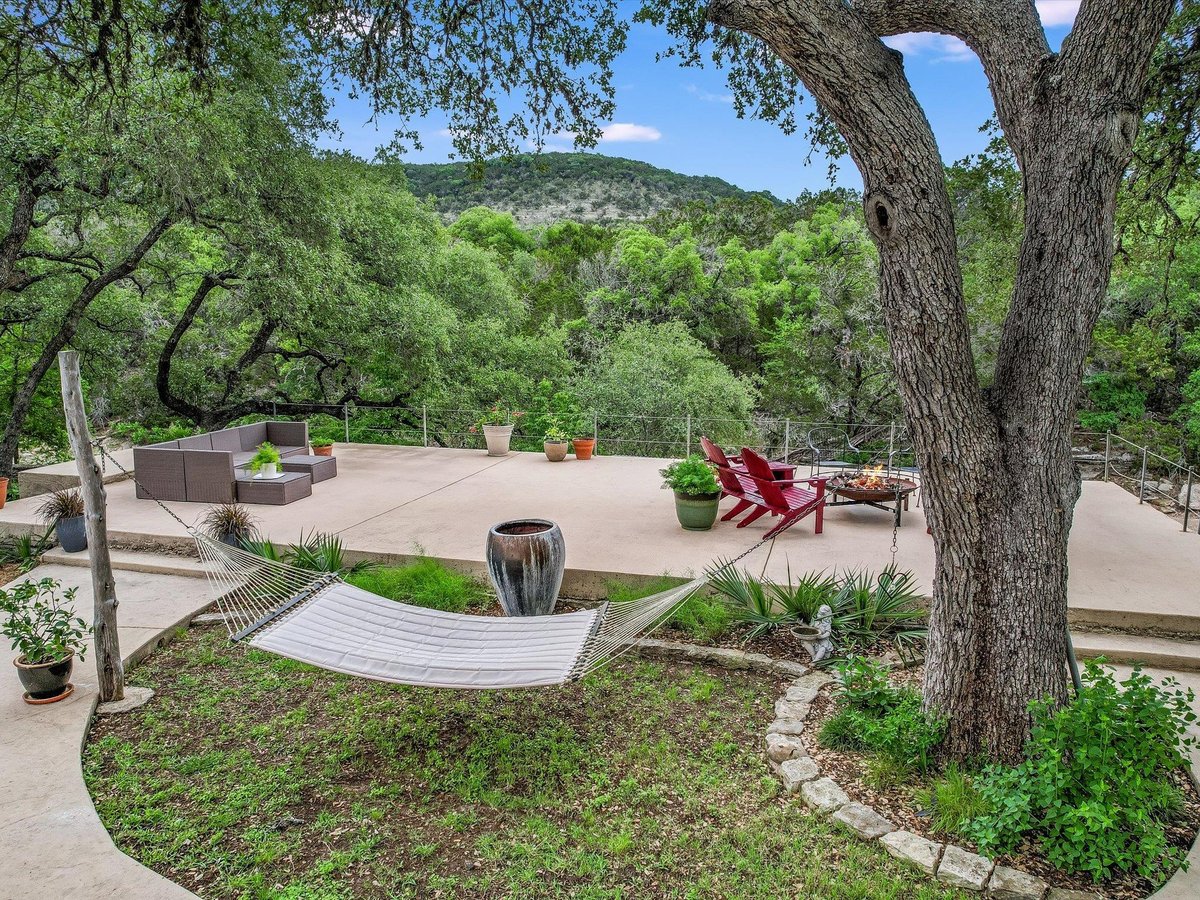 View 1500 Spoke Hollow RD in Spoke Pile Subdivision 1500 Spoke Hollow RD - front exterior - Luxury home in Spoke Pile Subdivision, Wimberley, TX