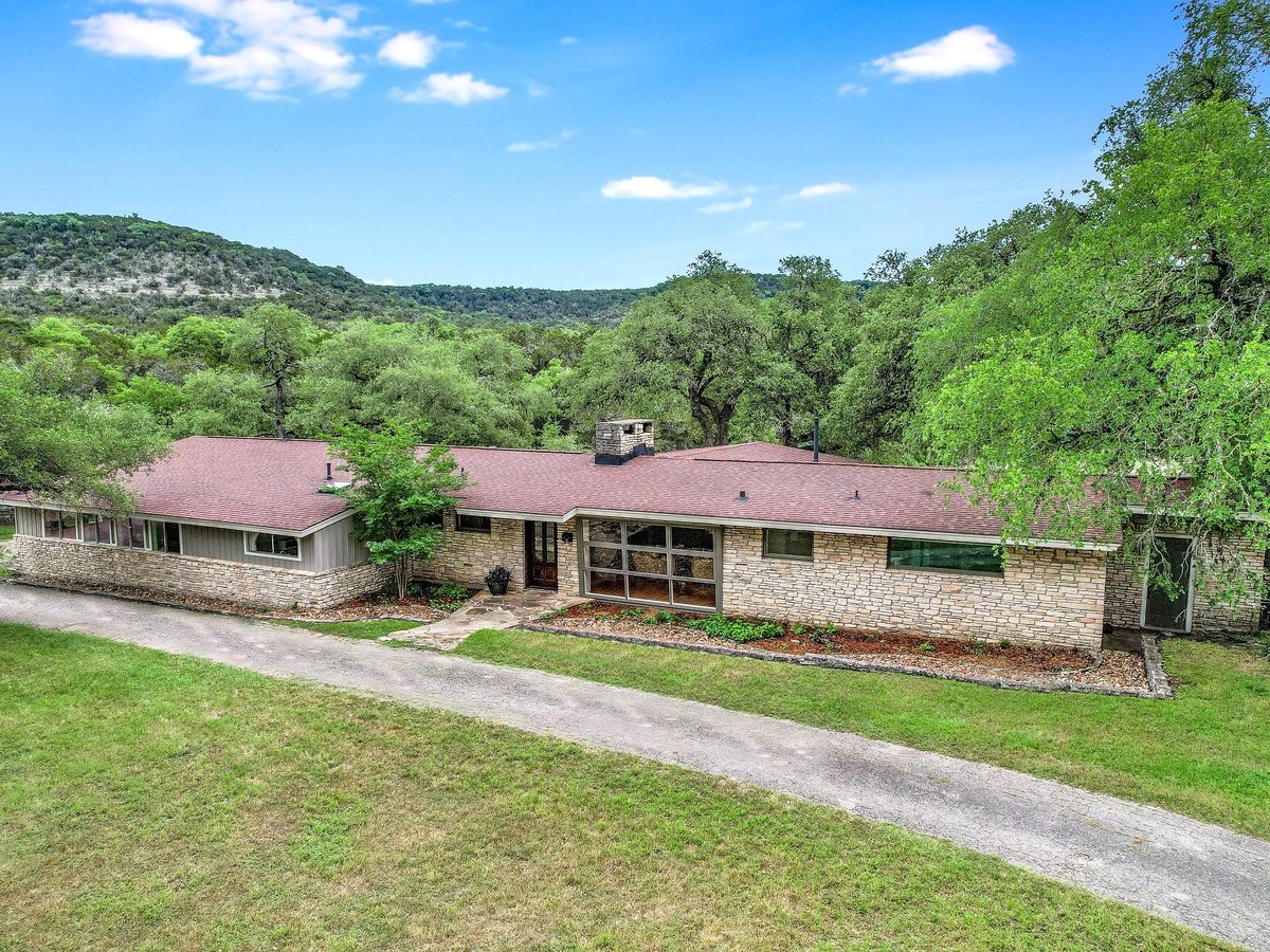 View 1500 Spoke Hollow RD in Spoke Pile Subdivision 1500 Spoke Hollow RD - property photo 1 - Luxury home in Spoke Pile Subdivision, Wimberley, TX