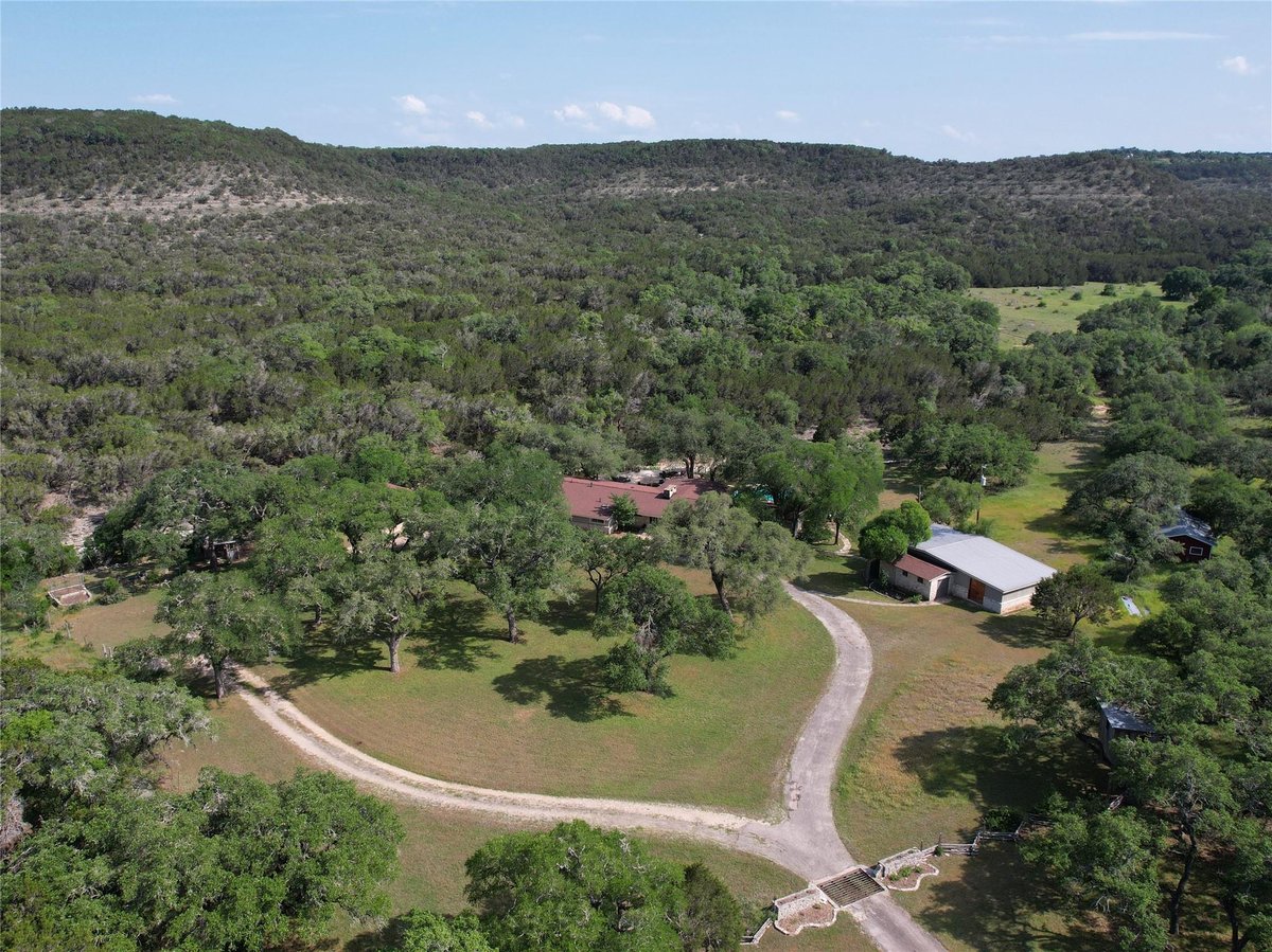 View 1500 Spoke Hollow Rd in Spoke Pile Subdivision 1500 Spoke Hollow Rd - front exterior - Luxury home in Spoke Pile Subdivision, Wimberley, TX