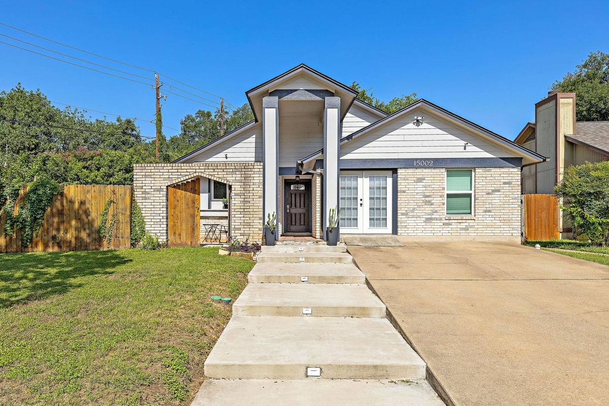 View 15002 Wells Port Dr in Wells Branch Ph E Sec 01 15002 Wells Port Dr - front exterior - Luxury home in Wells Branch Ph E Sec 01, Austin, TX
