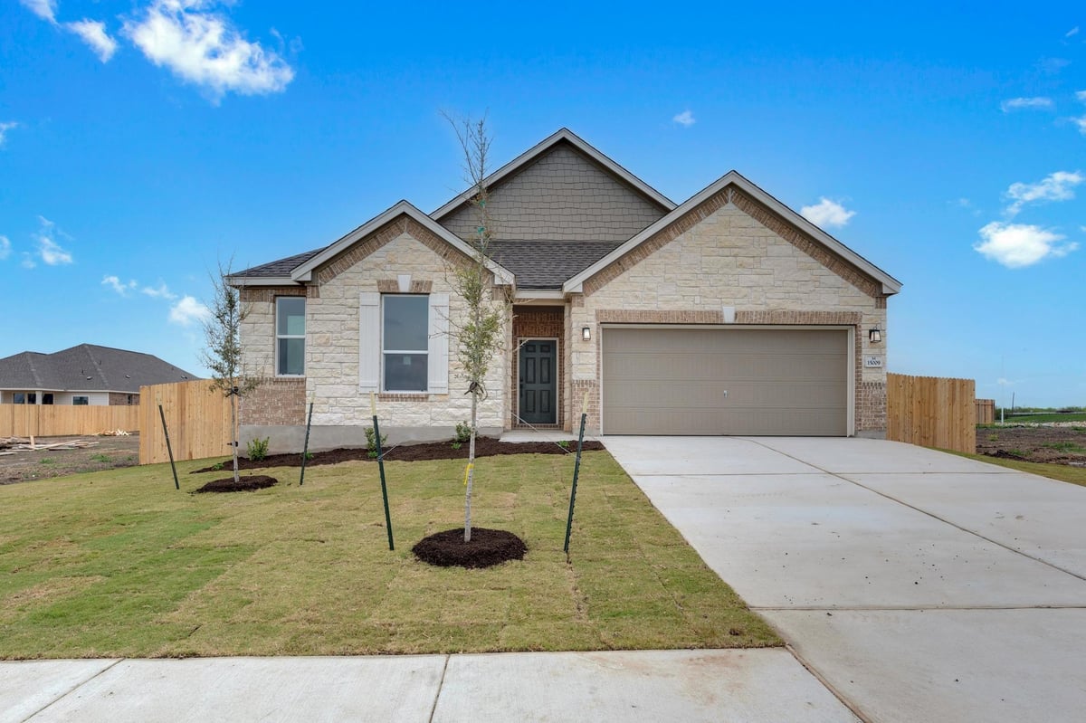 15009 Kiger Mustang DR - front exterior - Luxury home in Mustang Valley, Manor, TX
