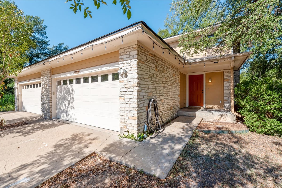 View 1504 Aquifer CV Unit #A in Beecave Woods Sec 02-Aa 1504 Aquifer CV Unit #A - front exterior - Luxury home in Beecave Woods Sec 02-Aa, Austin, TX