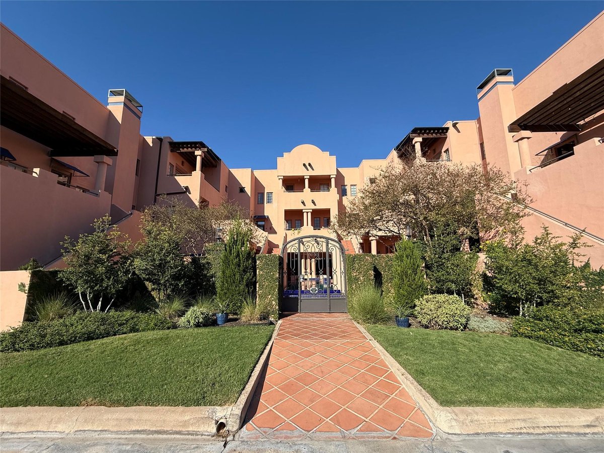 1506 W 13th St Unit #1 - front exterior - Luxury home in Escorial Condo, Austin, TX