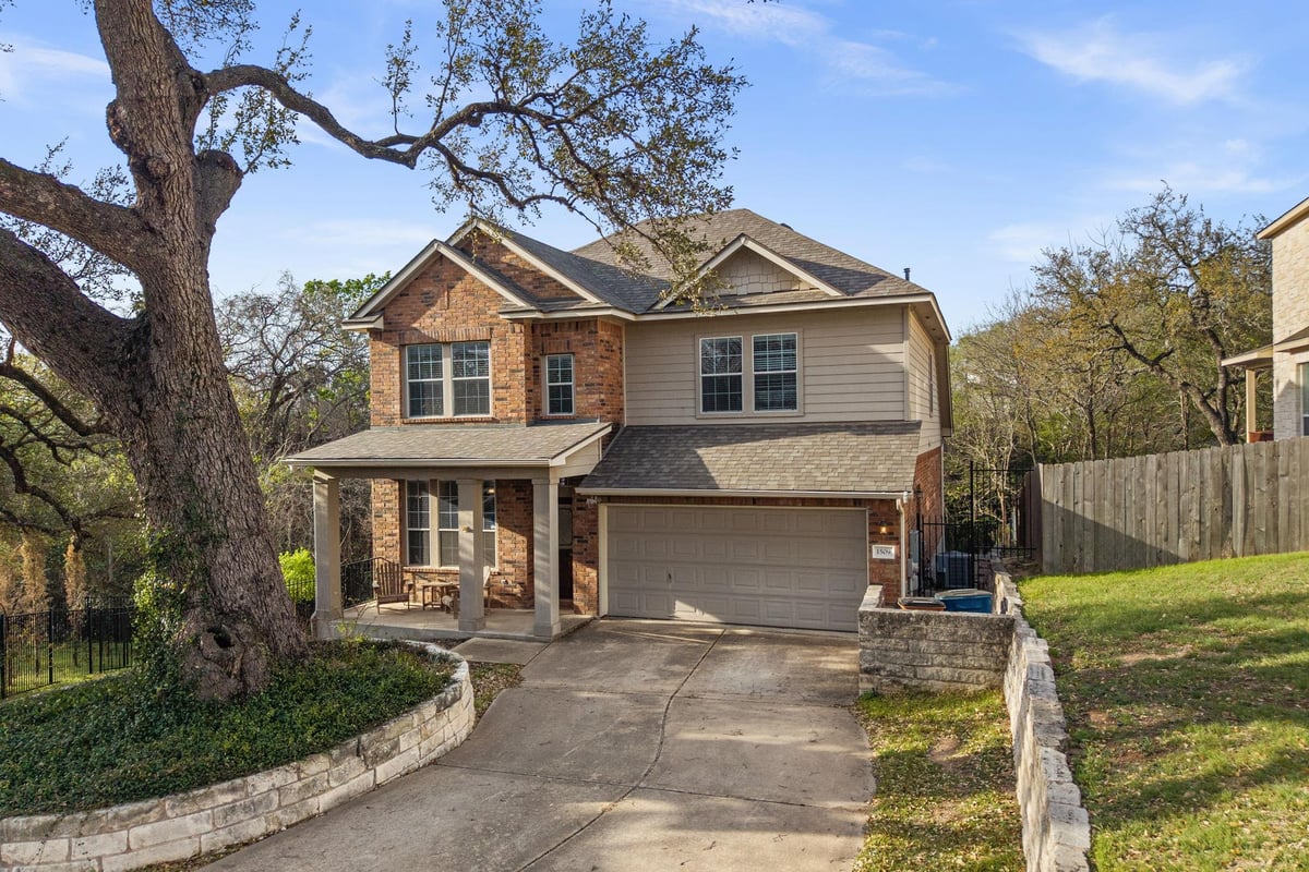 View 1509 Braxton Valley CV in Pioneer Crossing Ph A Sec 03 1509 Braxton Valley CV - front exterior - Luxury home in Pioneer Crossing Ph A Sec 03, Austin, TX