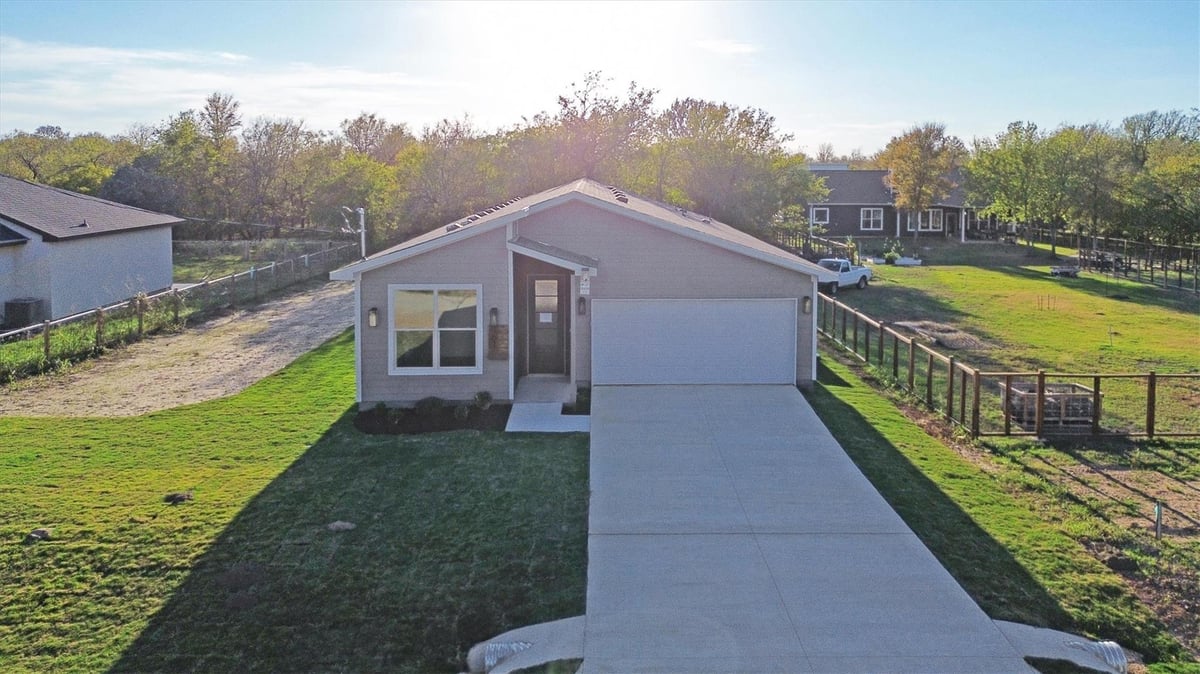 View 151 Kawainui LN in Tahitian Village, 151 Kawainui LN - front exterior - Luxury home in Tahitian Village,, Bastrop, TX