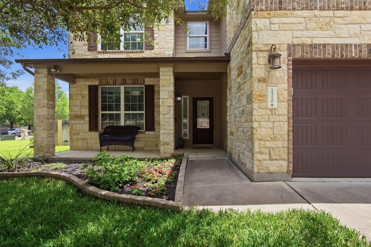 View 1510 Coldwater HOLW in Whispering Hollow Ph I Sec 5C 1510 Coldwater HOLW - front exterior - Luxury home in Whispering Hollow Ph I Sec 5C, Buda, TX