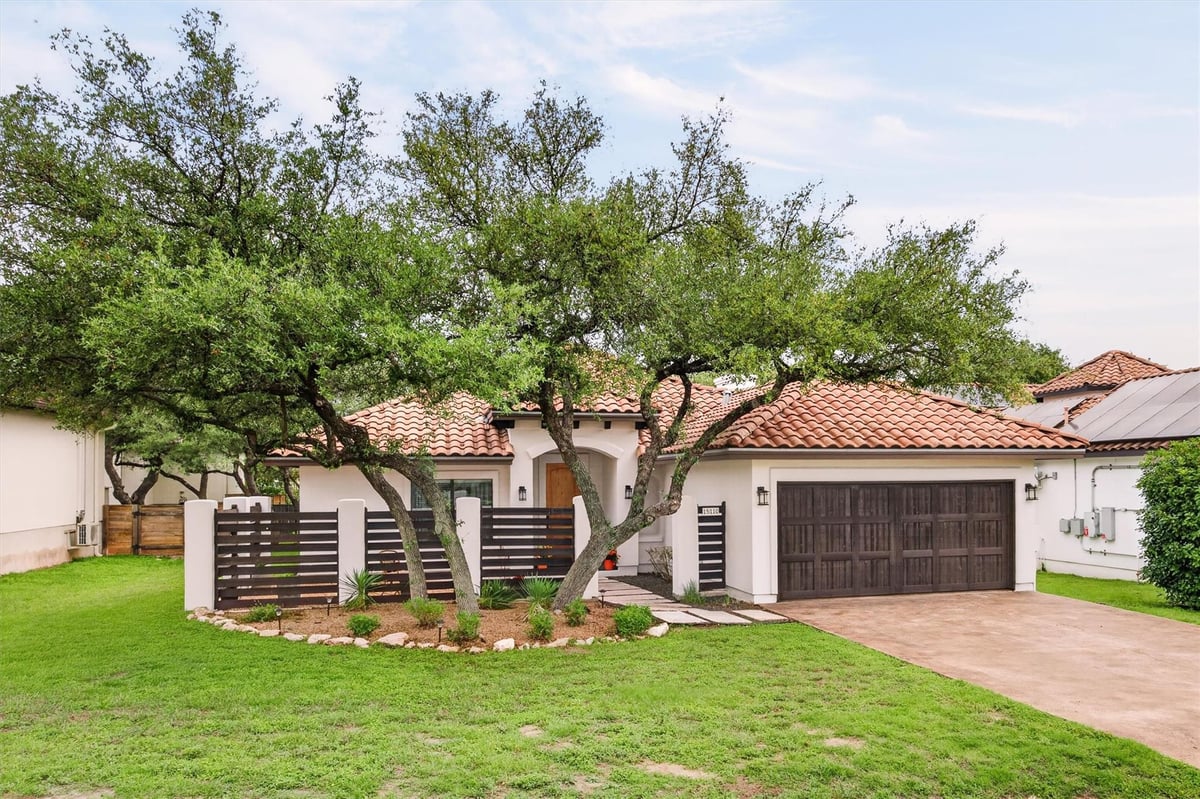 View 15110 Lariat Trl in Cardinal Hills Estates Unit 15 15110 Lariat Trl - front exterior - Luxury home in Cardinal Hills Estates Unit 15, Austin, TX