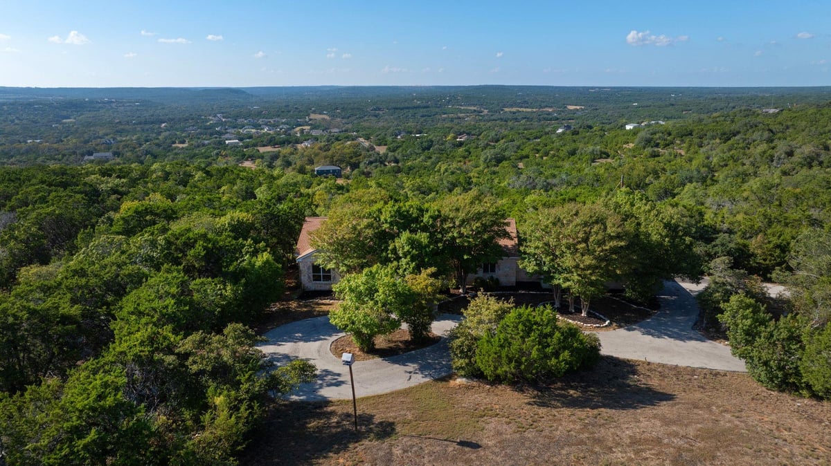View 15121 Honeycomb Holw in Honeycomb Hills 15121 Honeycomb Holw - front exterior - Luxury home in Honeycomb Hills, Leander, TX