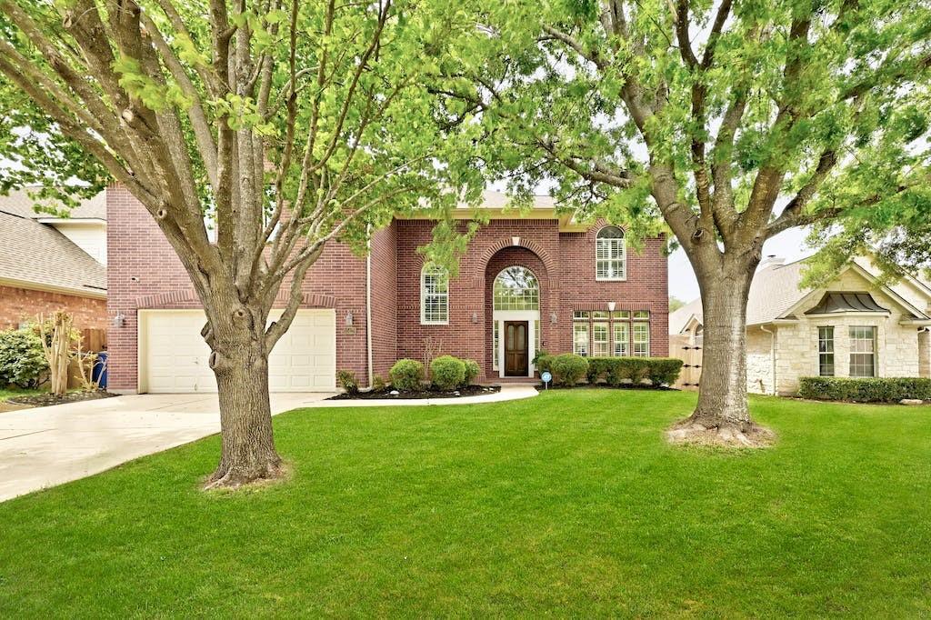 View 15128 Thatcher Dr in Davis Spring Sec 03-D Amd 15128 Thatcher Dr - front exterior - Luxury home in Davis Spring Sec 03-D Amd, Austin, TX