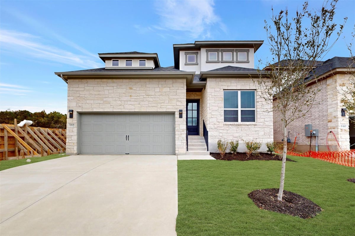 View 152 Bishop Wood Rd in Heritage 152 Bishop Wood Rd - front exterior - Luxury home in Heritage, Dripping Springs, TX