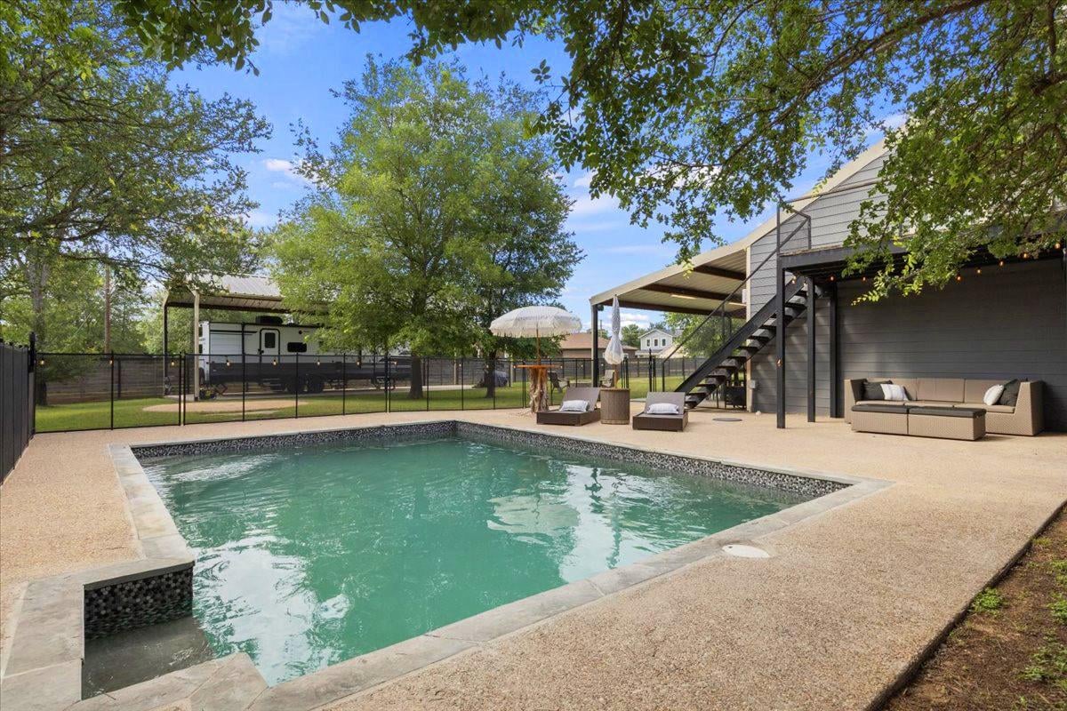 View 152 Keawakapu DR in Tahitian Village 152 Keawakapu DR - front exterior - Luxury home in Tahitian Village, Bastrop, TX